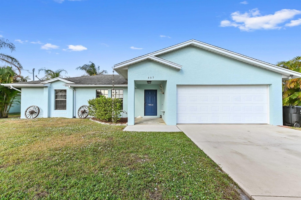 665 SW Backert Ave, Port Saint Lucie, FL 34953 - photo 1