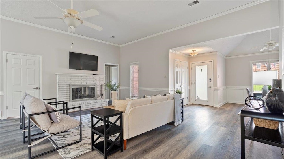 Living room with dark hardwood / wood-style floors