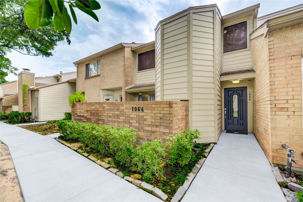 Welcoming front elevation towards street. Stunning