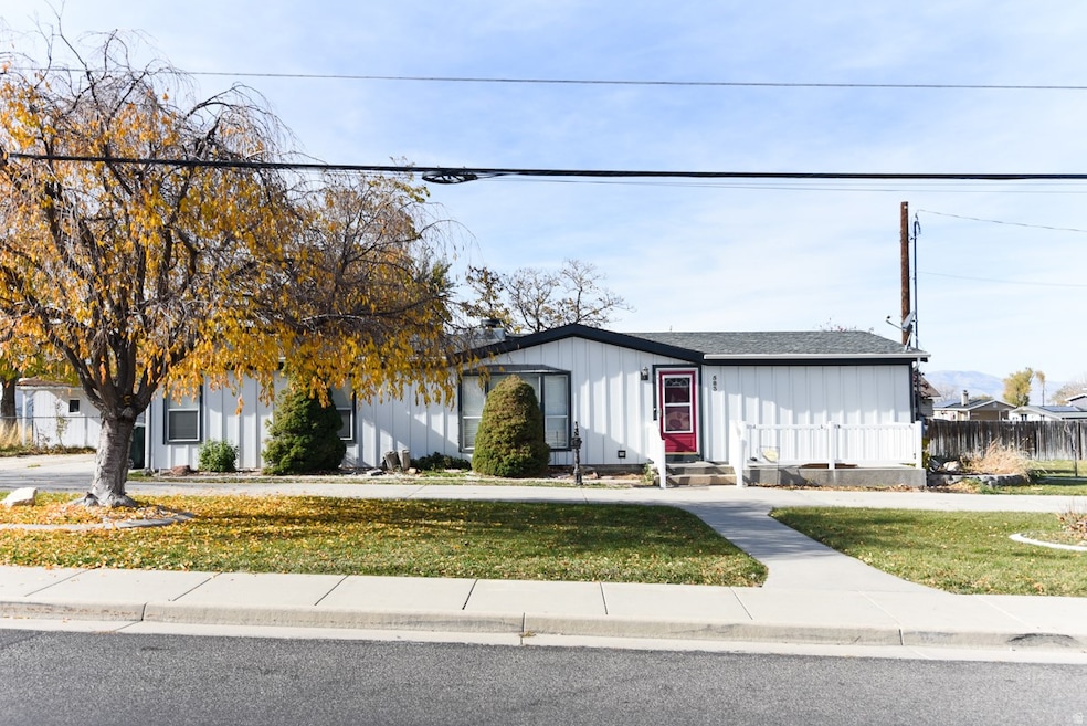 View of front facade with board and batten siding