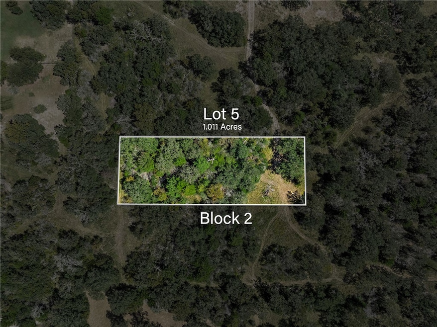 WOODED LOT - Property boundaries are approximate