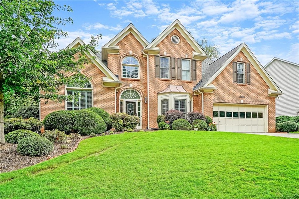 Stunning curb appeal for this three sides brick be