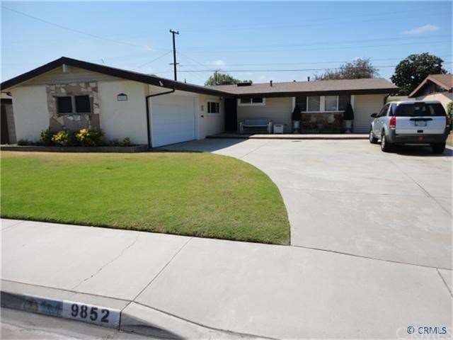 Front View w/concrete Driveway & extra parking