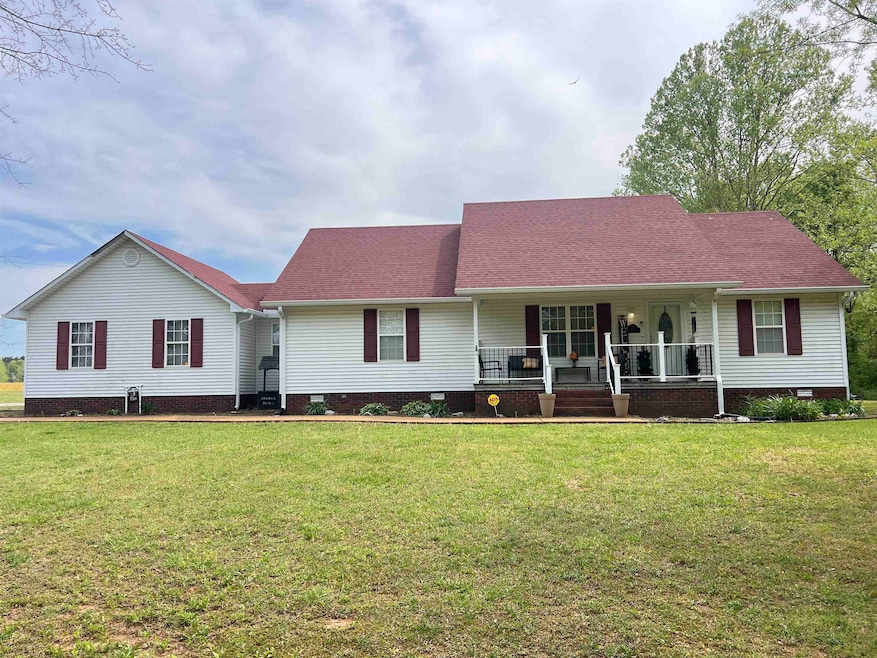 Single story home featuring a porch, crawl space, 