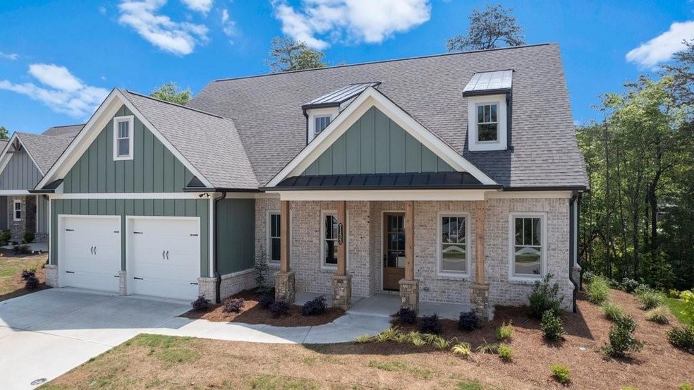 Craftsman inspired home featuring a garage
