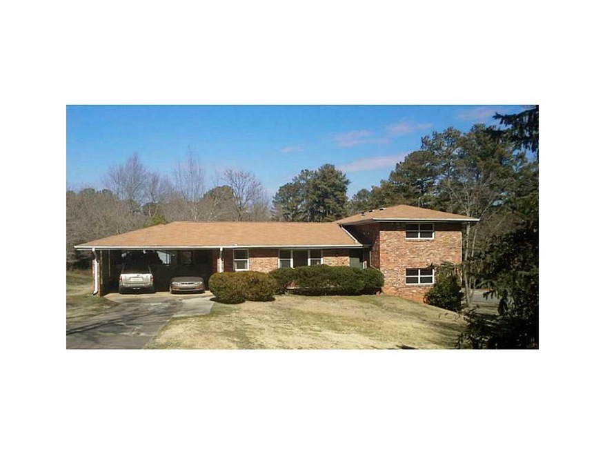 Exterior Front. All brick tri level with 4 roomy b