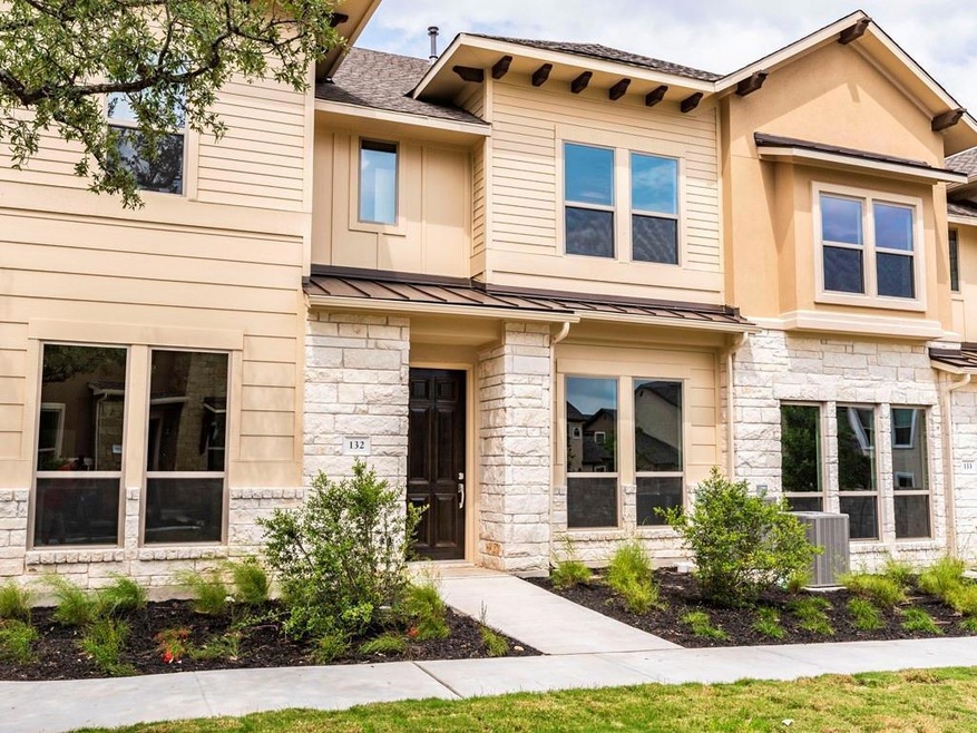 Townhome / multi-family property with a standing 