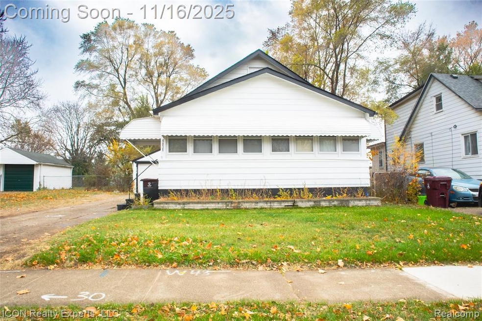 View of front of property with a front lawn