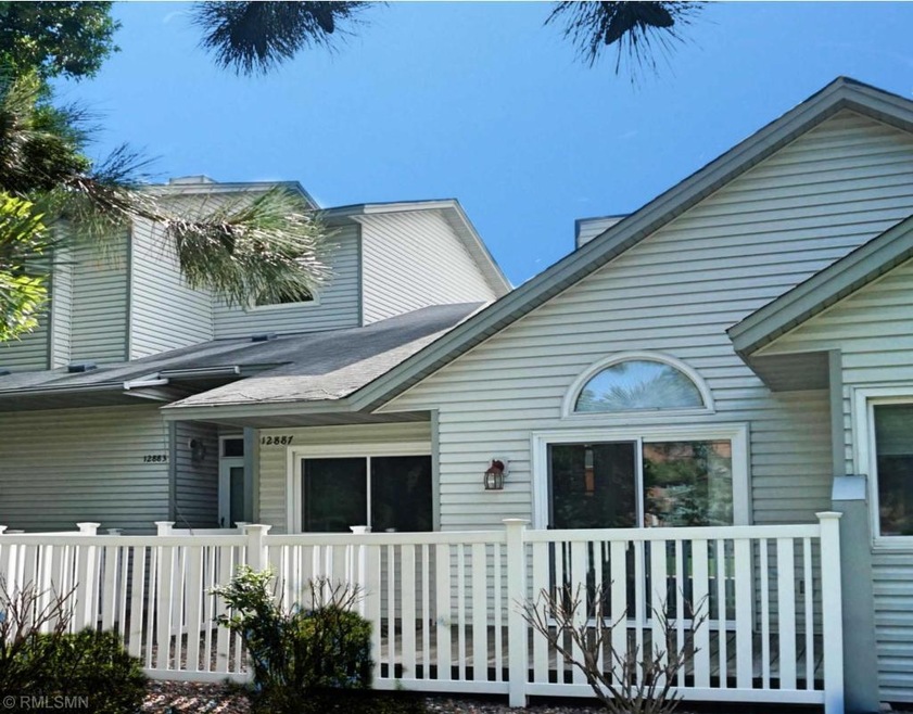 82nd Front of Home with Deck/Patio