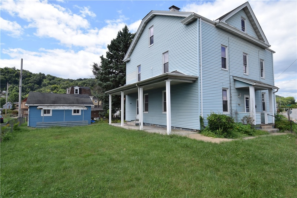 Entrance for 1st floor unit located off back yard