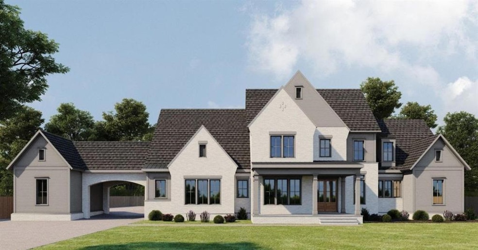 View of front of property featuring a front lawn