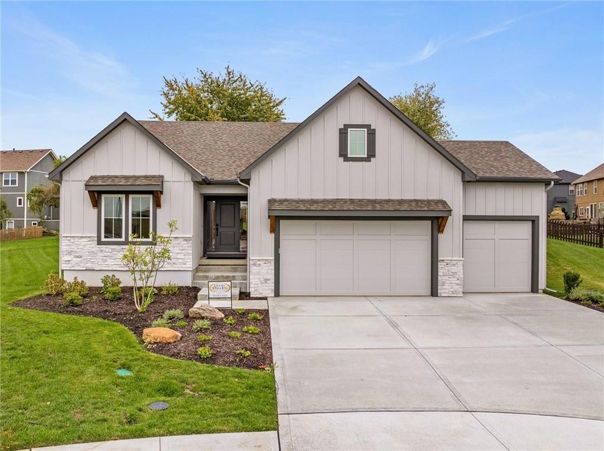 1233 Edwards Cir, Raymore, MO 64083 - photo 1