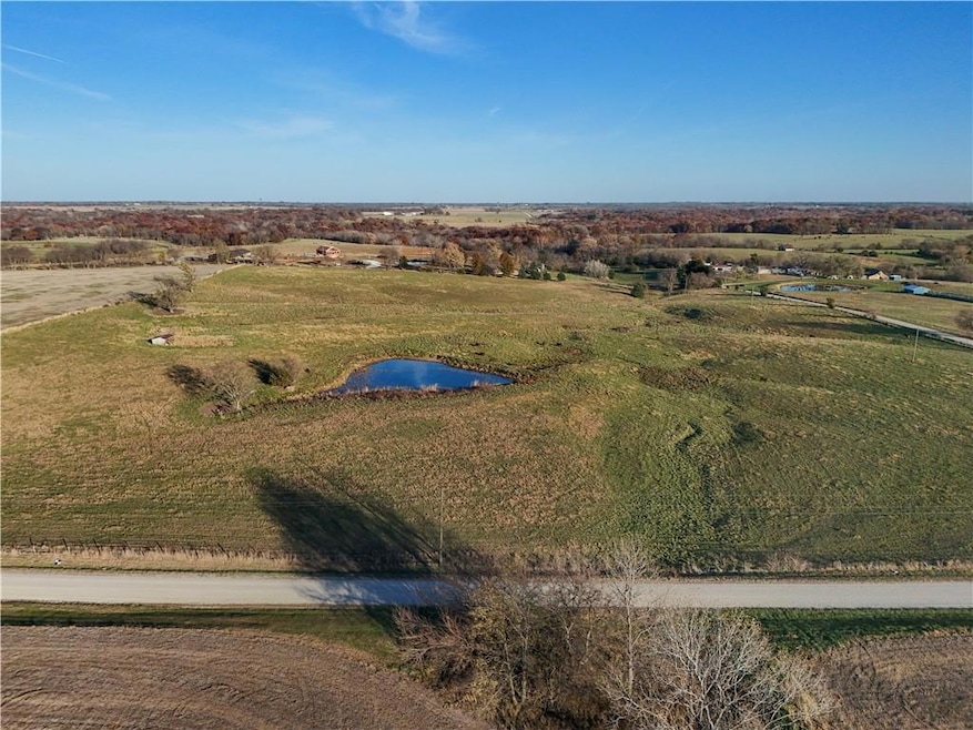 Aerial view of sparsely populated area with a nearby body of water