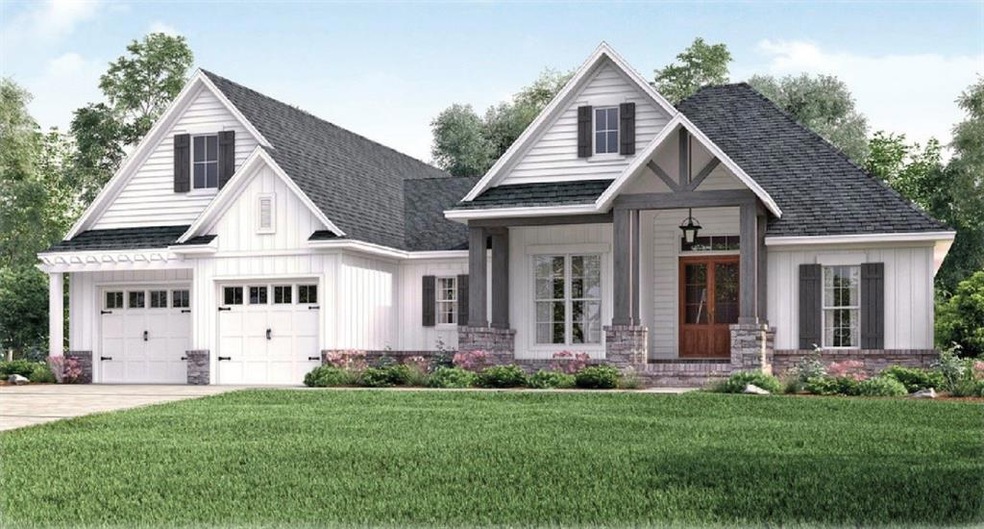 View of front facade featuring a front yard