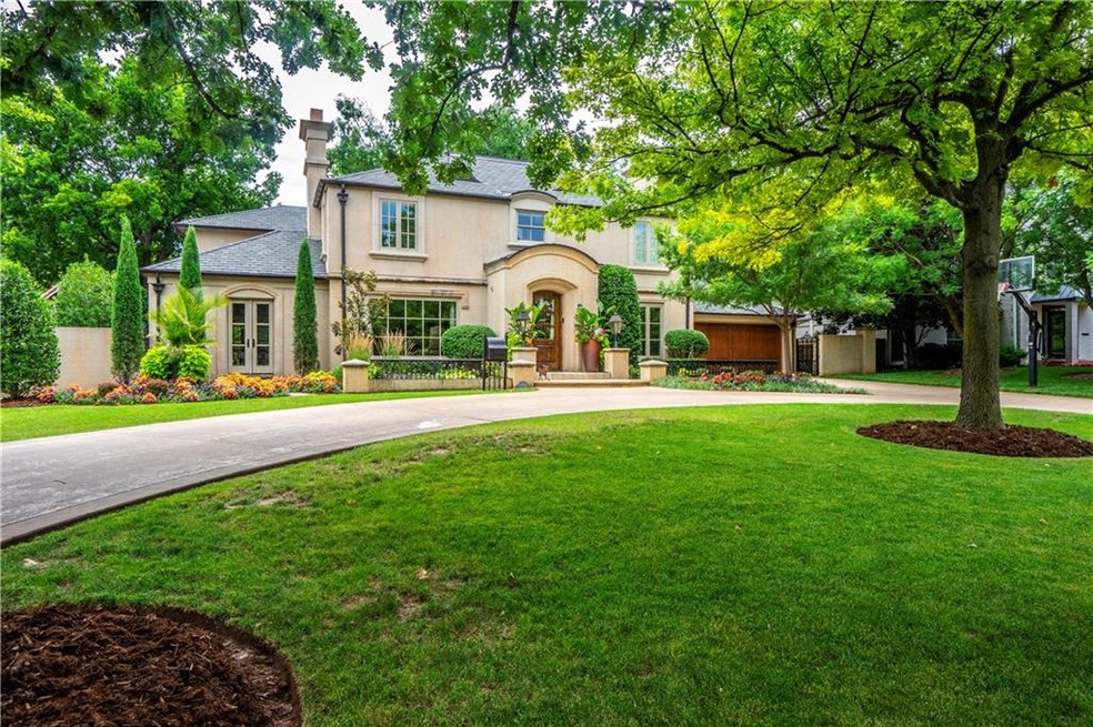 Elegant exterior with lush landscaping