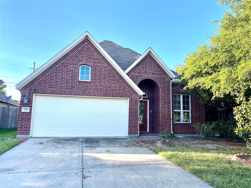 6914 Mimosa View Ln, Houston, TX 77086 - photo 1