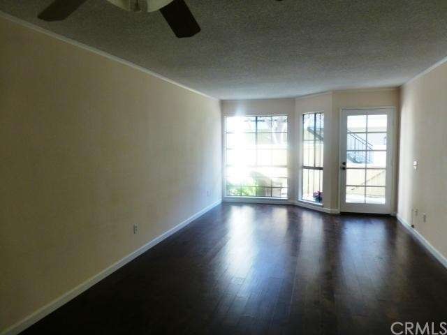 Light and bright with REAL hardwood floors!