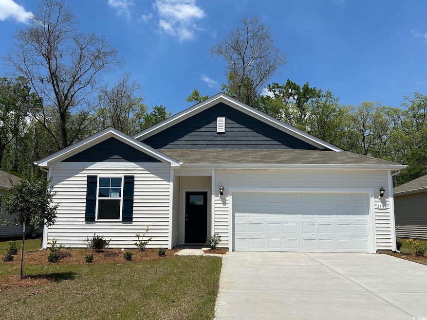 View of front of property featuring a front lawn, 