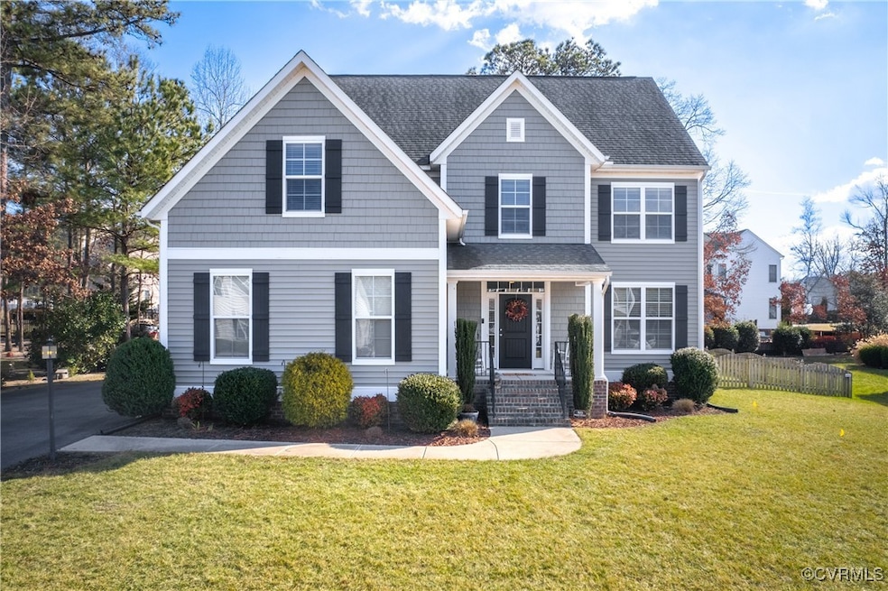 View of front of property featuring a front yard