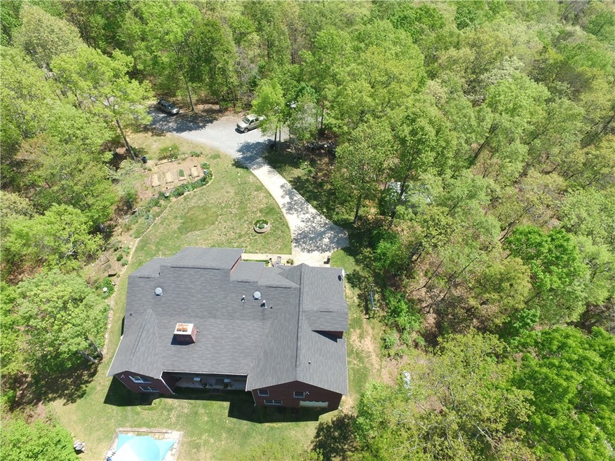 Ariel View from back of home showing drive way