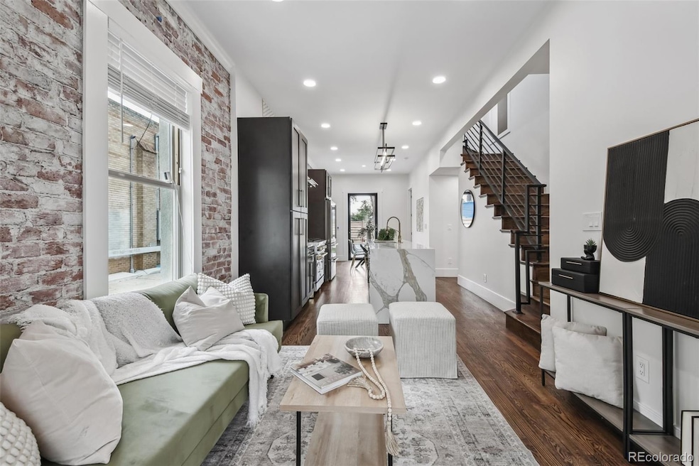 Living room w/ Exposed brick