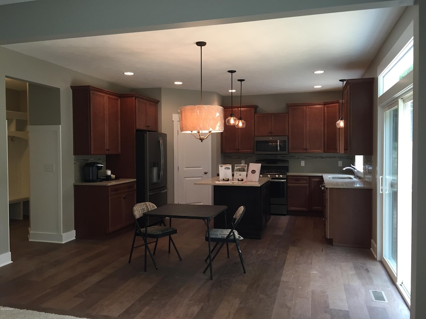 1433 Copperfield St SW, Byron Center, MI 49315 - photo 1