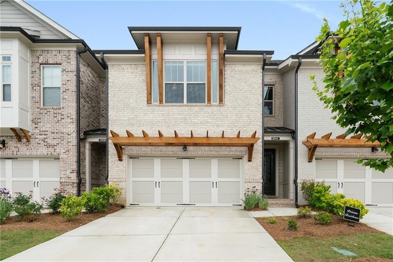 Three story,  4 bedroom 3 1/2 Bath townhome one of