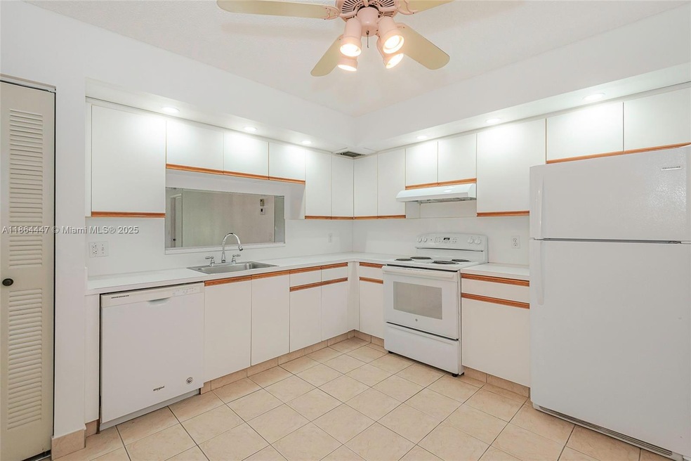 12701 SW 13th St unit 107F, Pembroke Pines, FL 33027 - photo 1