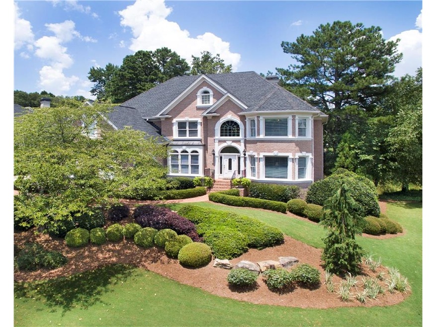 Stately Executive Home on Corner Lot  with 3 car s