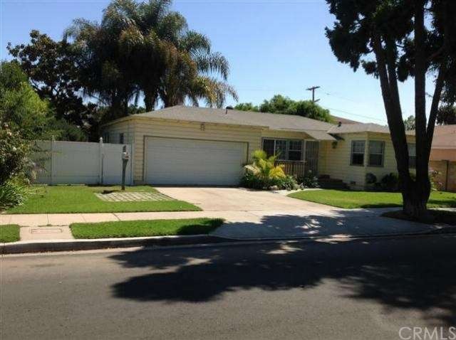 Front of Home large well landscaped grounds