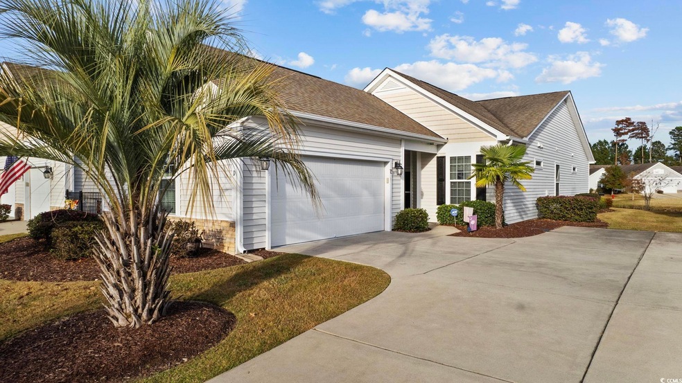 Single story home featuring a garage