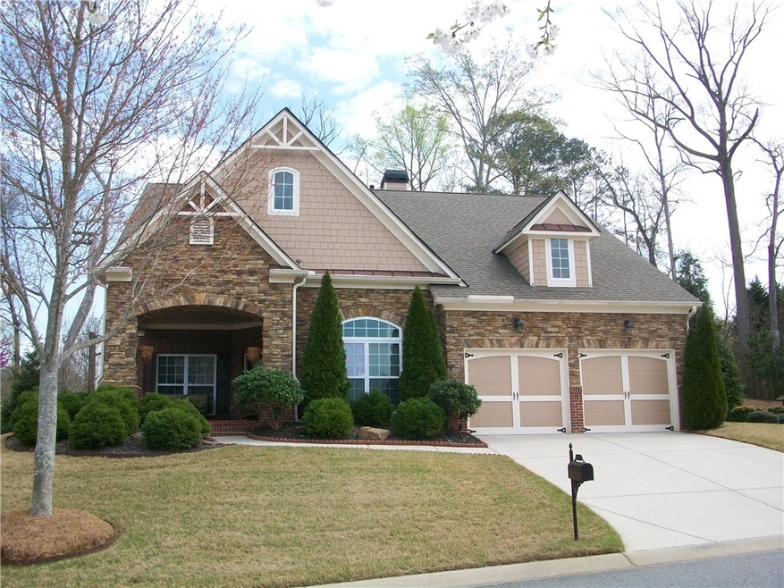 Stacked stone, shake and brick - this craftsman st