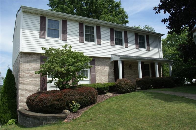 Beautiful brick and new vinyl sided home with amaz