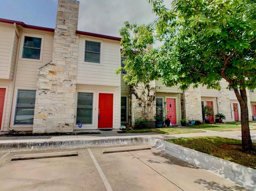 Townhome / multi-family property with uncovered p
