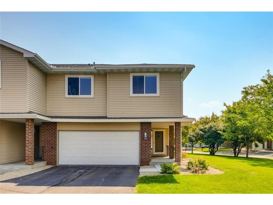 Front of home. End unit with ton of green space on