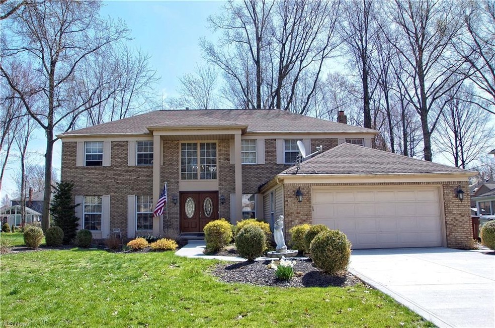 Beautiful curb appeal with new driveway and landsc