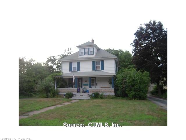 Exterior Front. Large colonial with front porch an