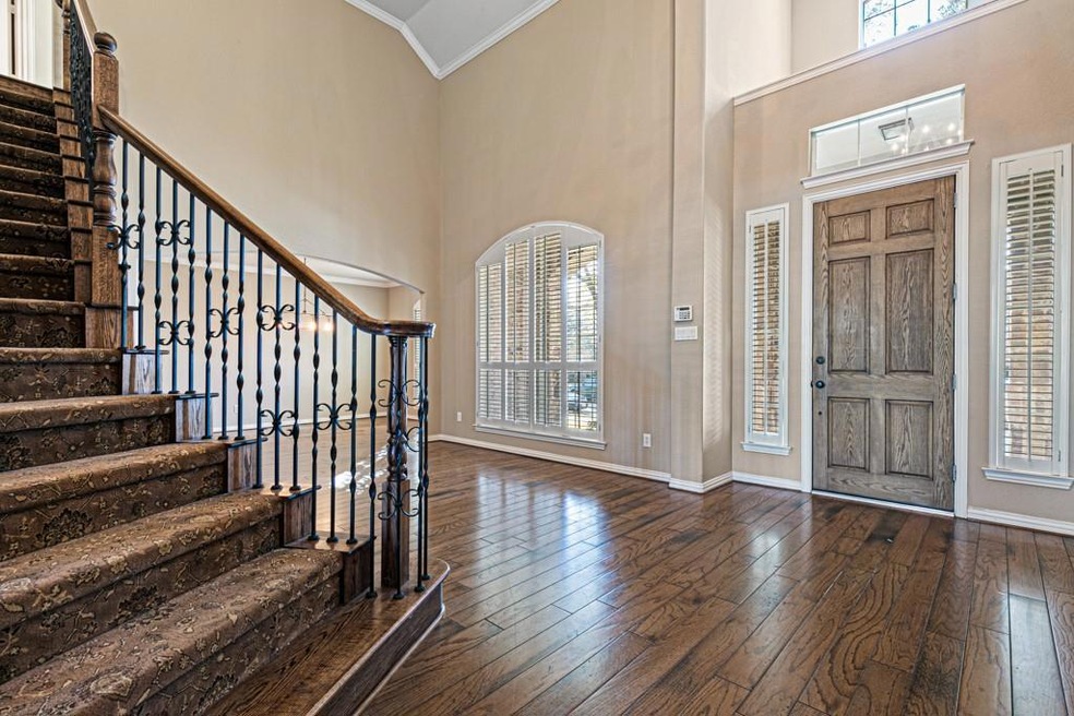 Entry with elegant staircase