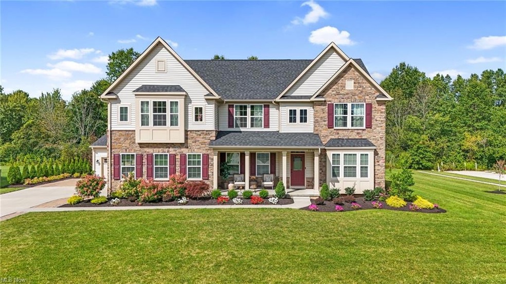 View of front of property with a front yard