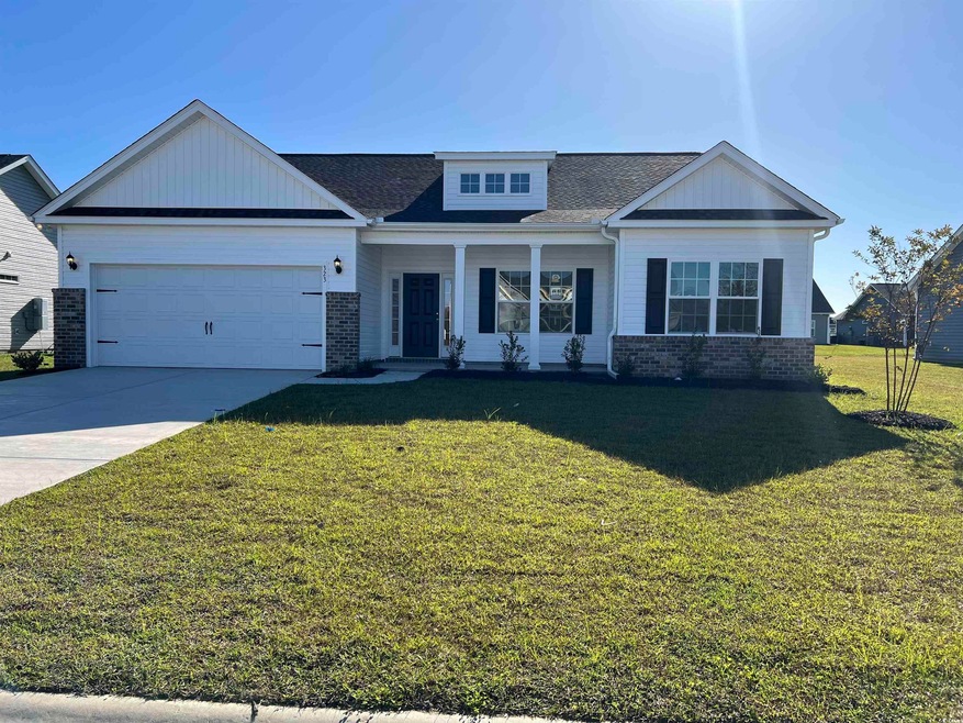 View of front of house featuring a garage and a fr