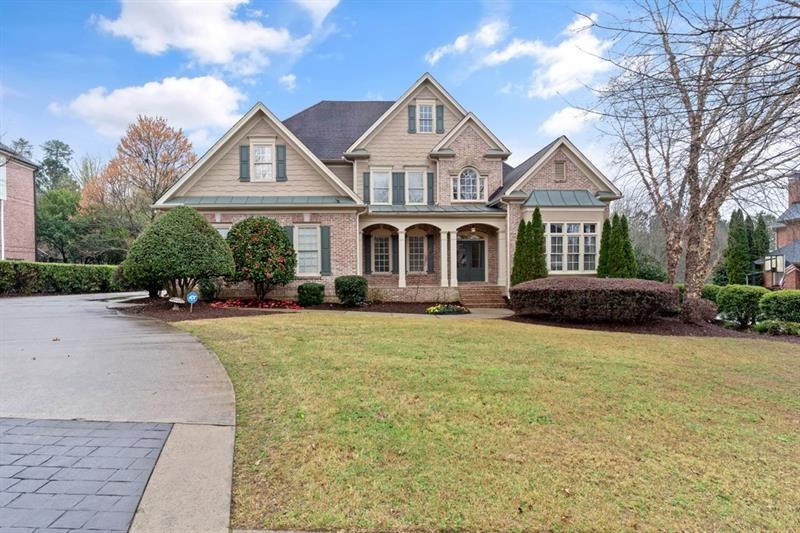 4 sided brick custom home with master on main on t