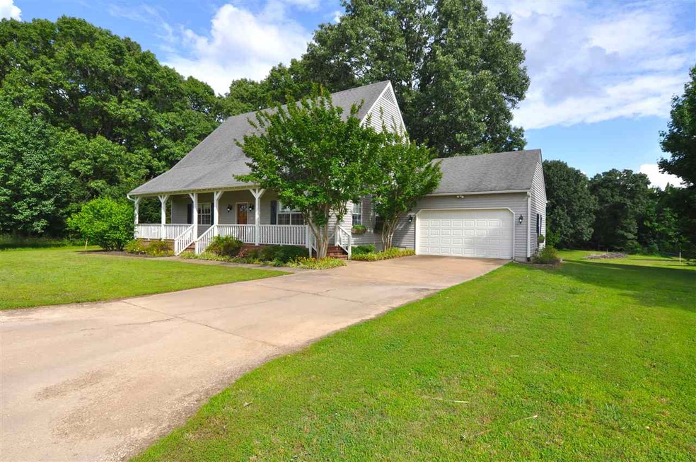 This amazing country home is nestled on 7.06 beaut