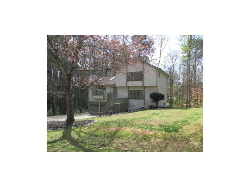 FRONT VIEW, ALMOST ONE ACRE LOT