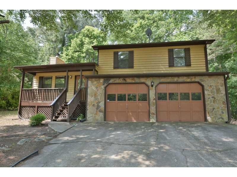 Exterior Front. Stone and wood siding compliments 