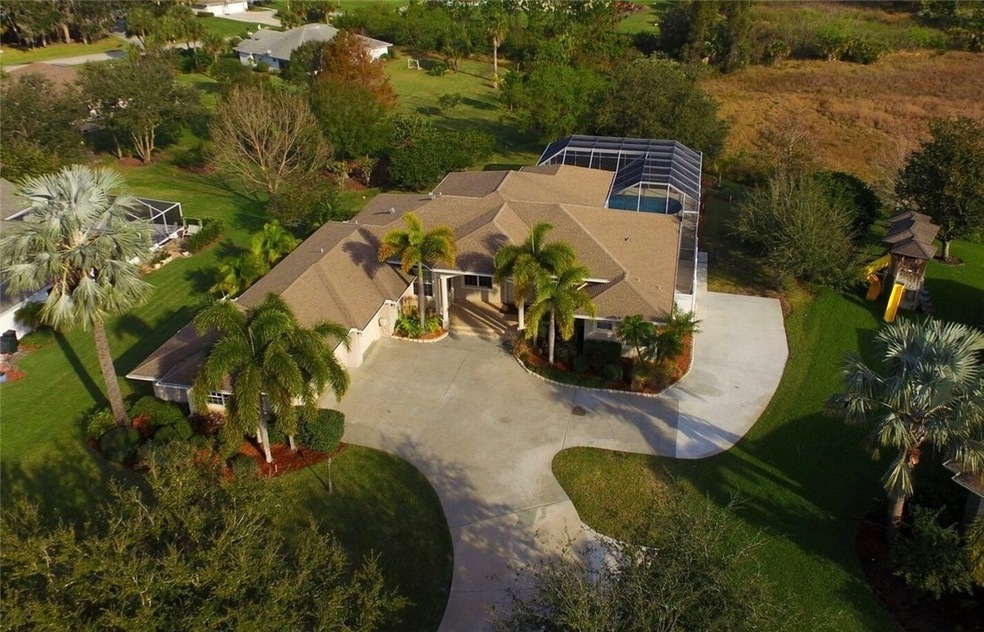 Aerial shot showing property on 3/4 acre private p