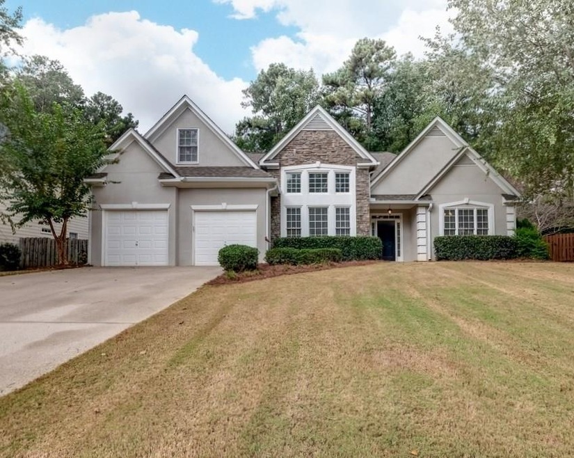 Welcome home to your beautiful stacked stone resid
