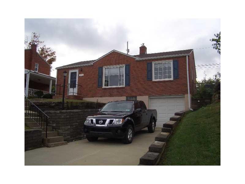Exterior Front. THE ROOF USES ARCHITECTURAL TILING