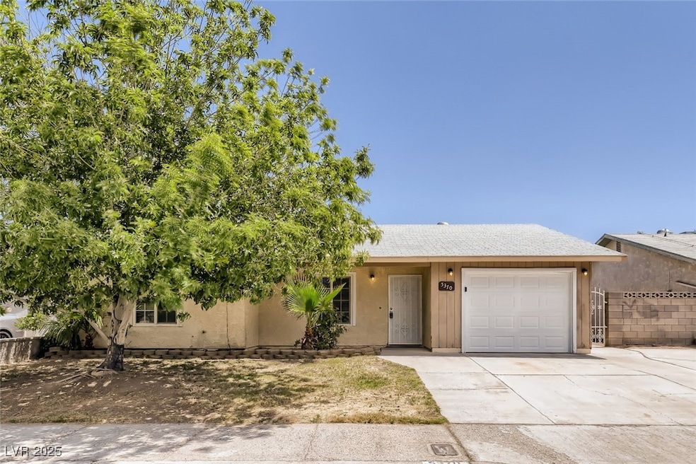 Single story home featuring an attached garage, dr