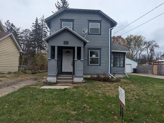 216 W Clark St, Jackson, MI 49203 - photo 1