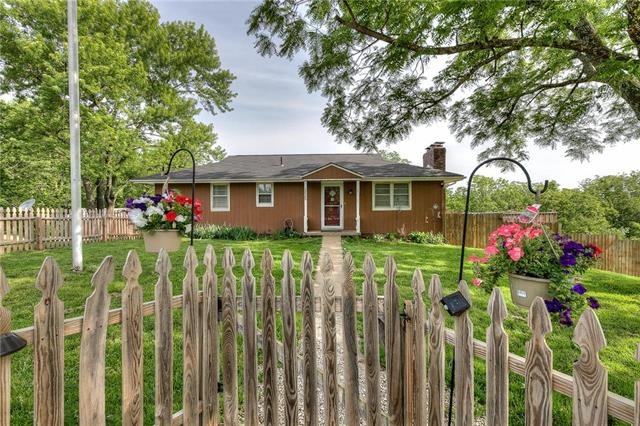 The front of the country charmer home.